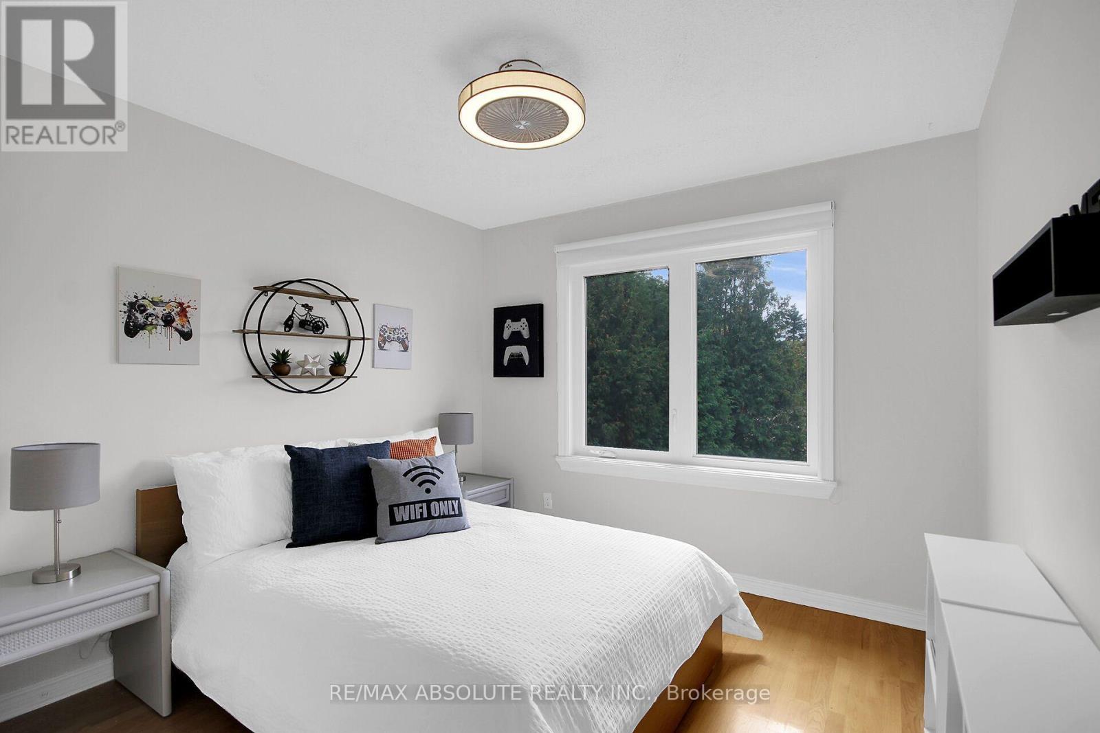 Bedroom 2 with Hardwood Floor - 38 Forestglade Crescent, Ottawa, ON