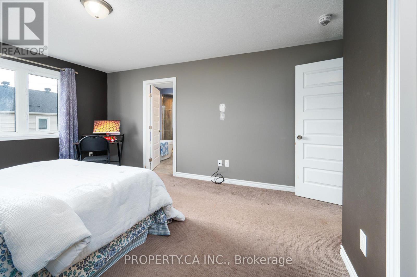 Bright primary bedroom retreat - 125 Sweetvalley Drive, Ottawa, ON
