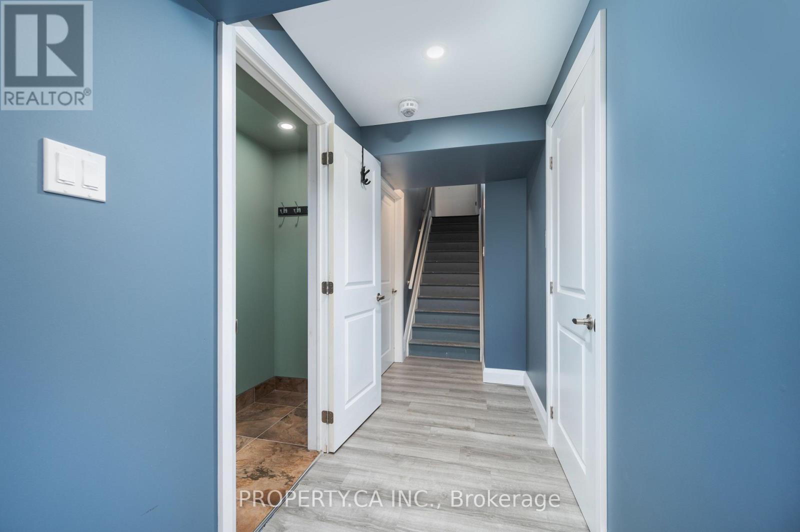 Bright basement hallway - 125 Sweetvalley Drive, Ottawa, ON
