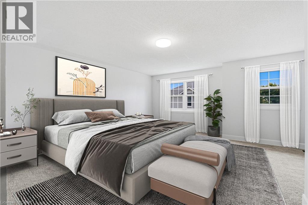 Recessed lighting, crown molding, and dual windows with natural light - 30 S Imperial Road Unit# 3, Guelph, ON