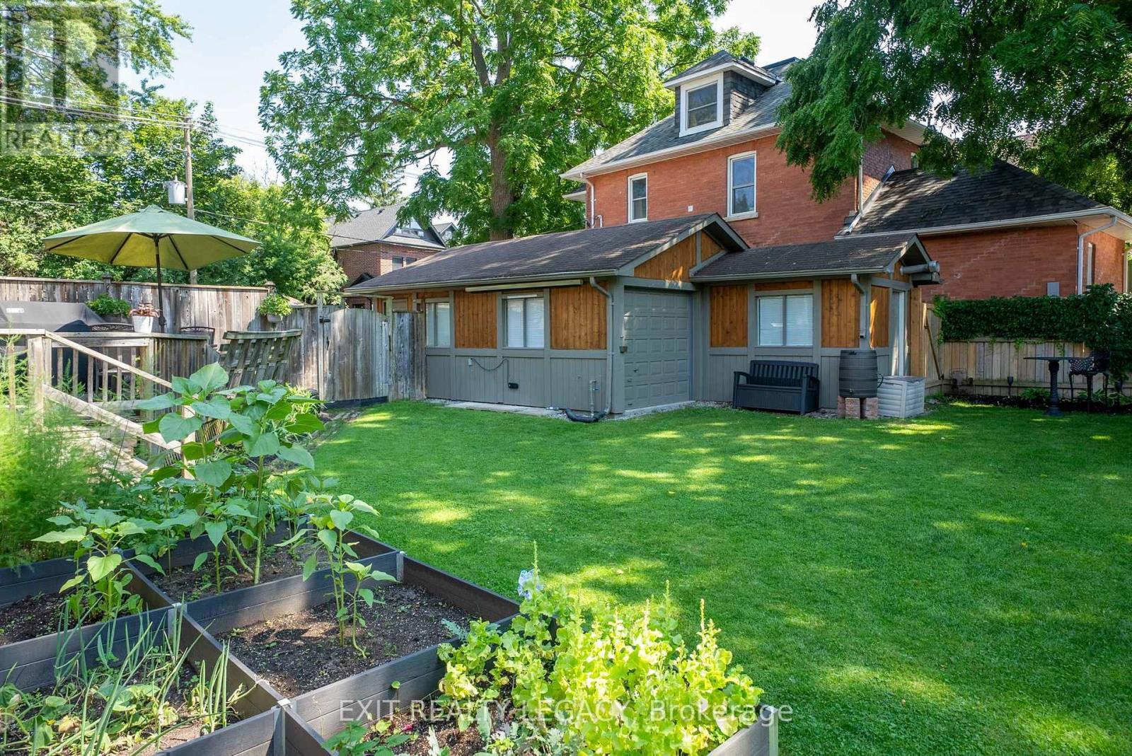 Private backyard with garden - 126 Temperance Street, Aurora, ON