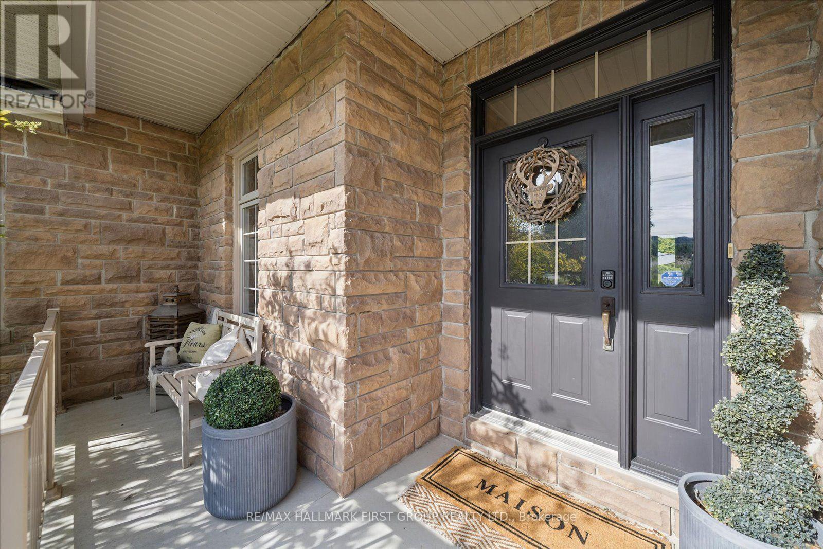 Front Entrance w/ Porch - 33 Deerfield Drive, Hamilton Township, ON