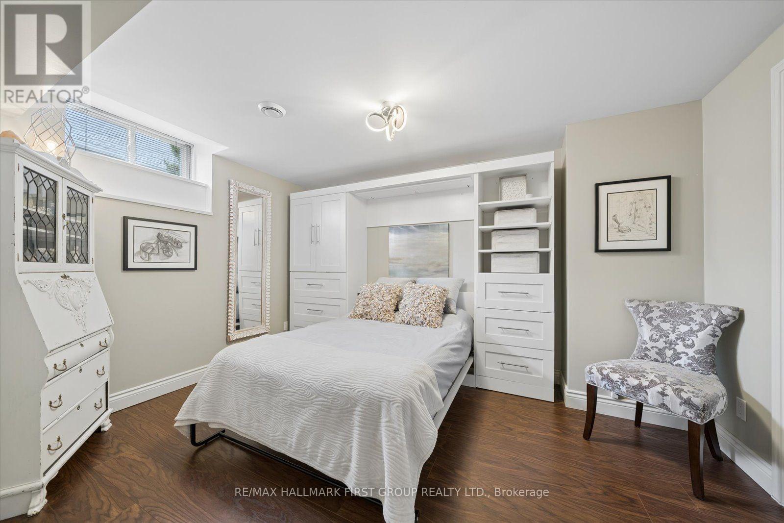 Multi-Use Room w/ Murphy Bed Opened - Lower Level - 33 Deerfield Drive, Hamilton Township, ON