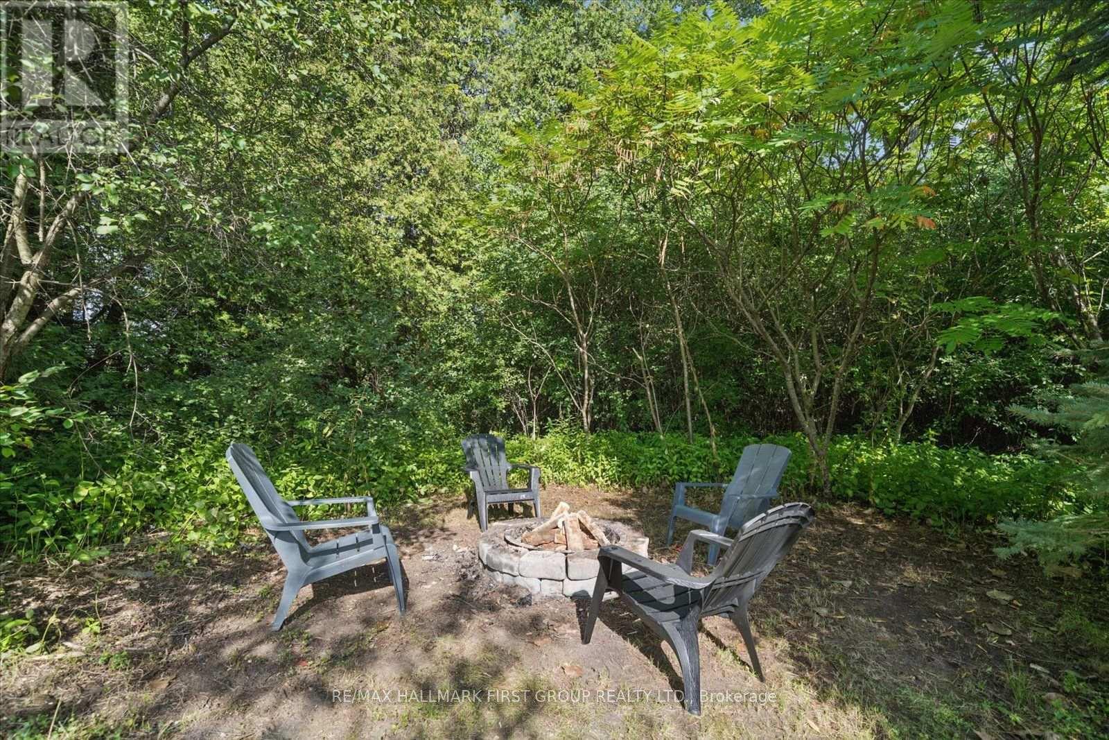 Cozy Firepit At Rear of Property - 33 Deerfield Drive, Hamilton Township, ON