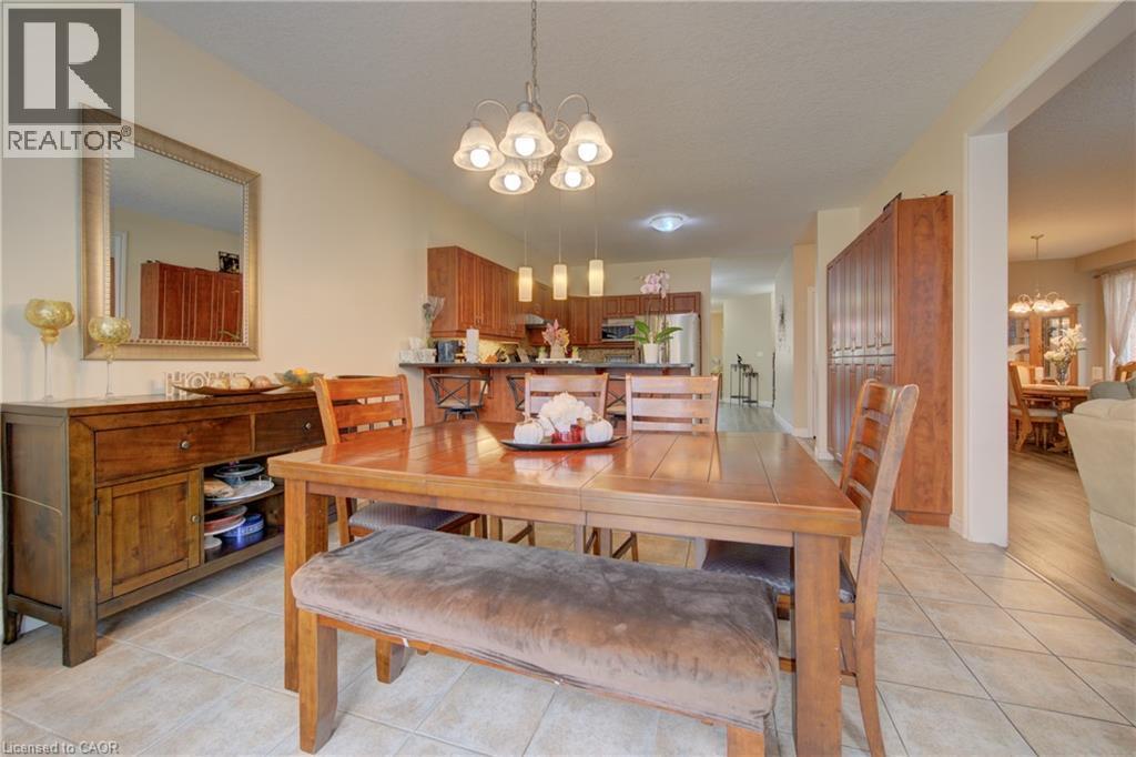 Wood-finish flooring, neutral wall tones - 78 Stuckey Avenue, Baden, ON