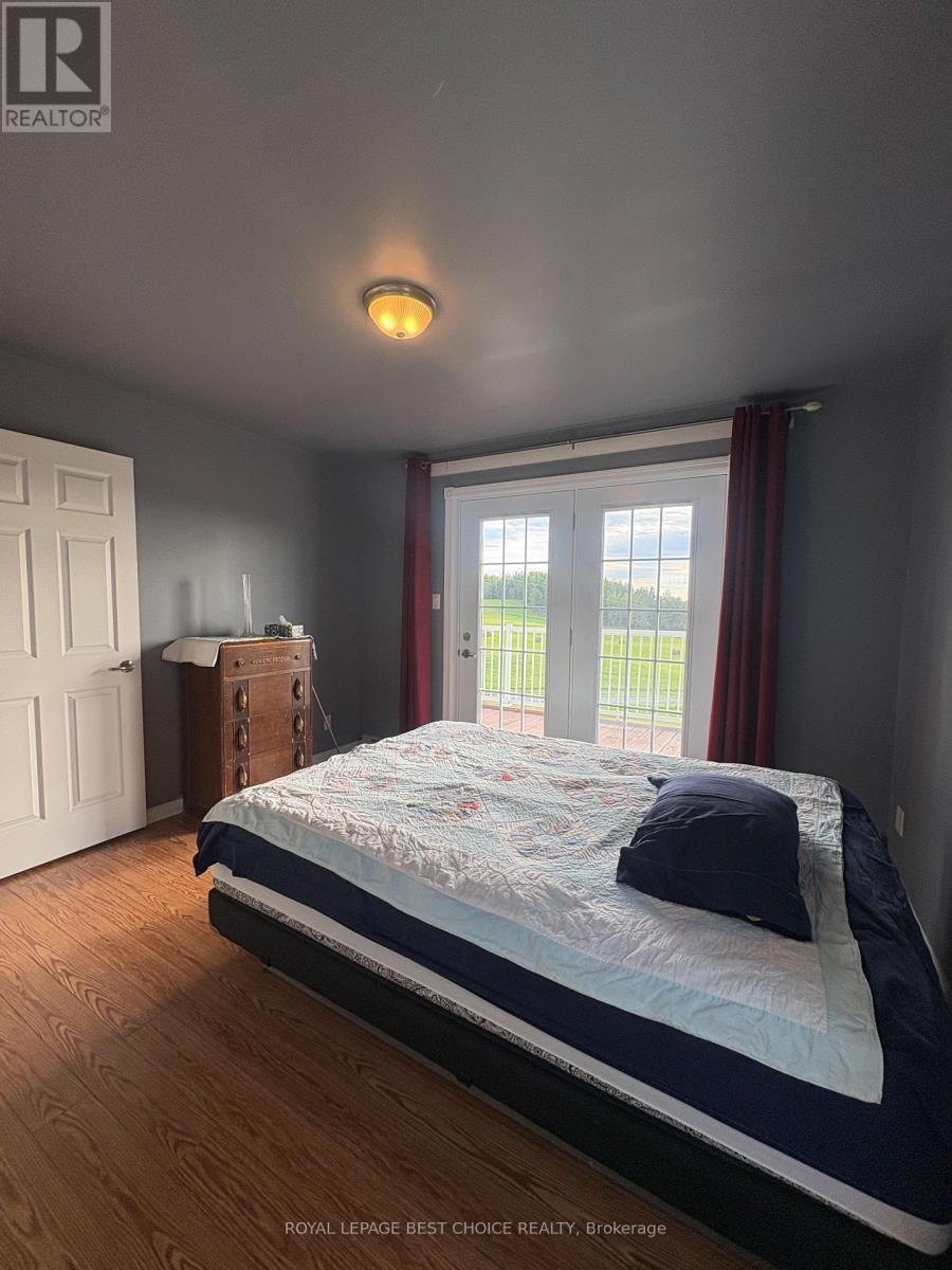 Primary Bedroom walks out to Deck - 234389 Wendigo Lake Road, Englehart (Central Timiskaming), ON