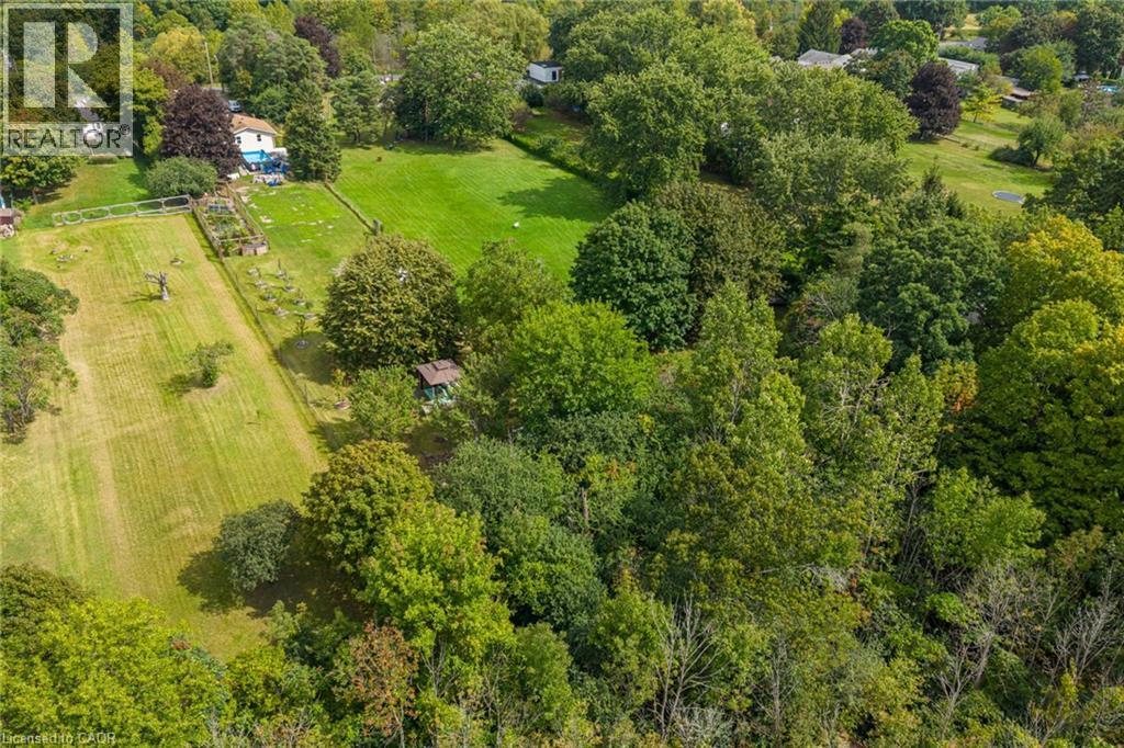 Expansive property with substantial tree coverage and large open grass areas - 1412 Old York Road, Burlington, ON