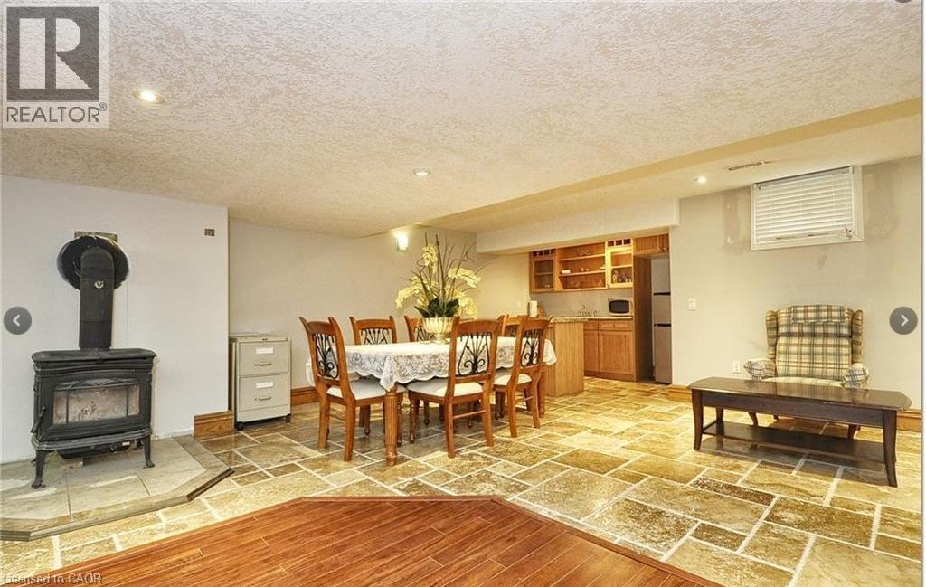 Wood-finish flooring and stone tile flooring - 915 Briardean Road, Cambridge, ON