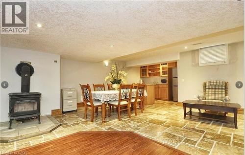Wood-finish flooring and stone tile flooring - 915 Briardean Road, Cambridge, ON 
