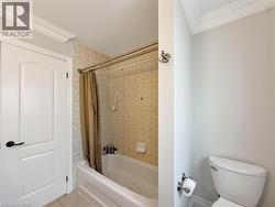 White paneled door with black hardware -