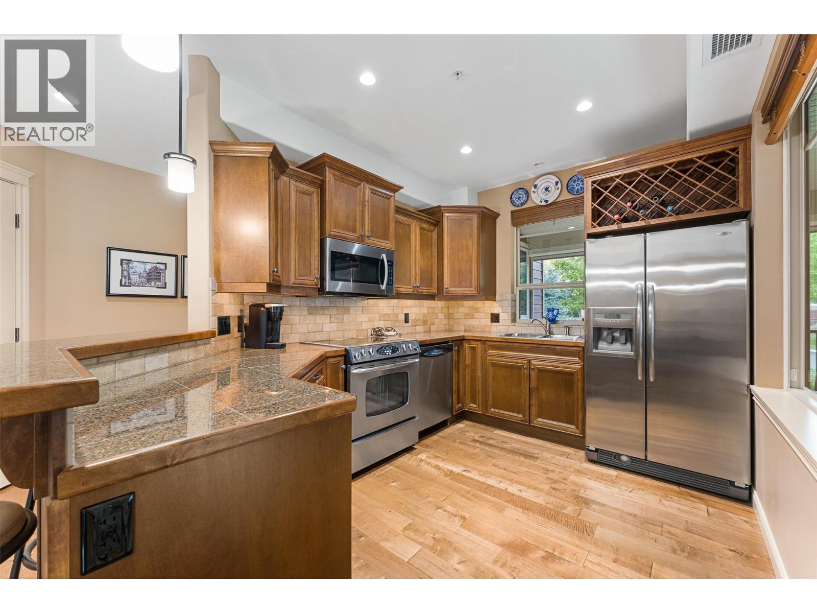 Beautiful kitchen with stainless appliance package. - 2780 Auburn Road Unit# 203, West Kelowna, BC