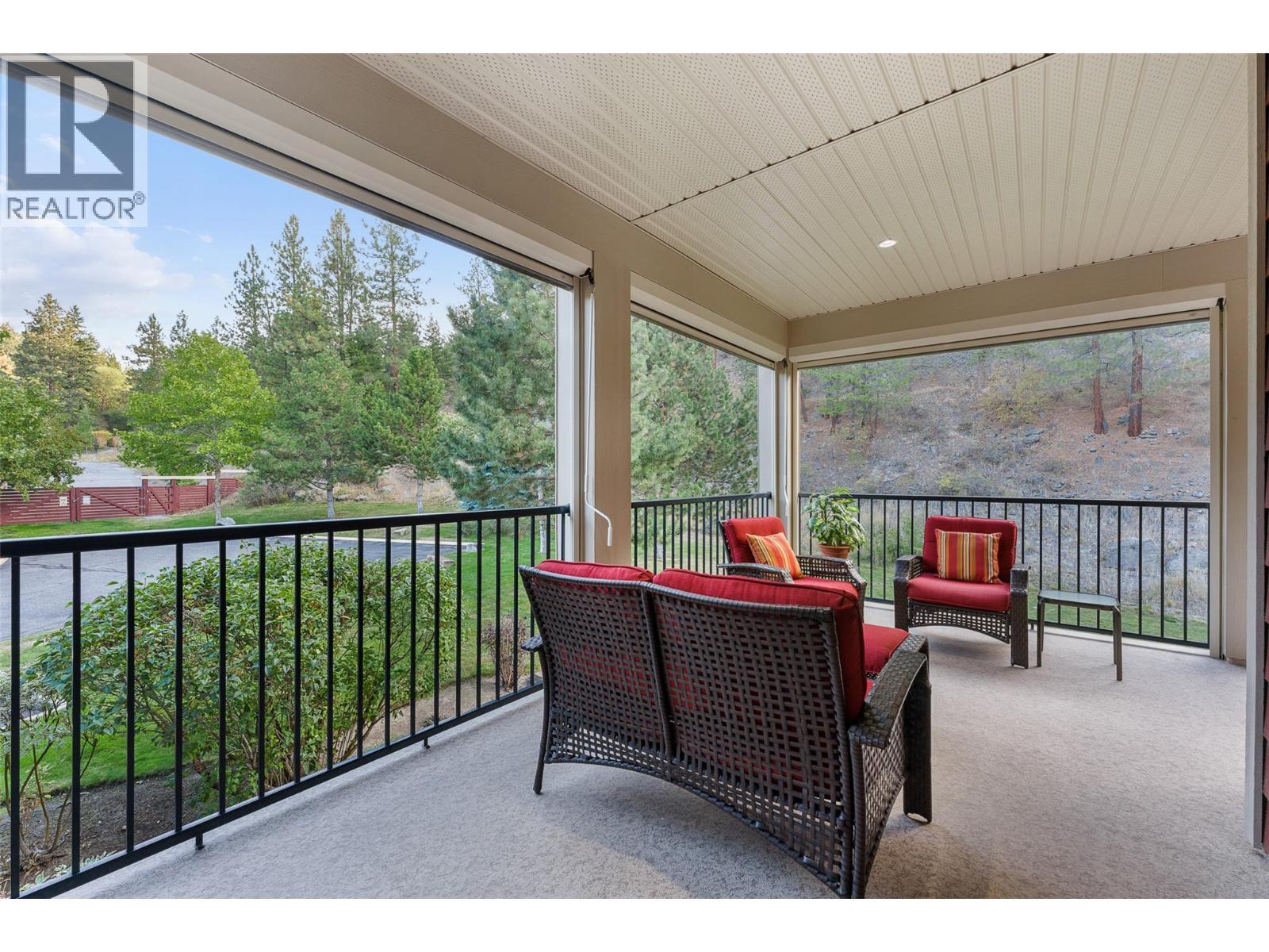 Custom Phantom screen package creates a secluded exterior living space! - 2780 Auburn Road Unit# 203, West Kelowna, BC