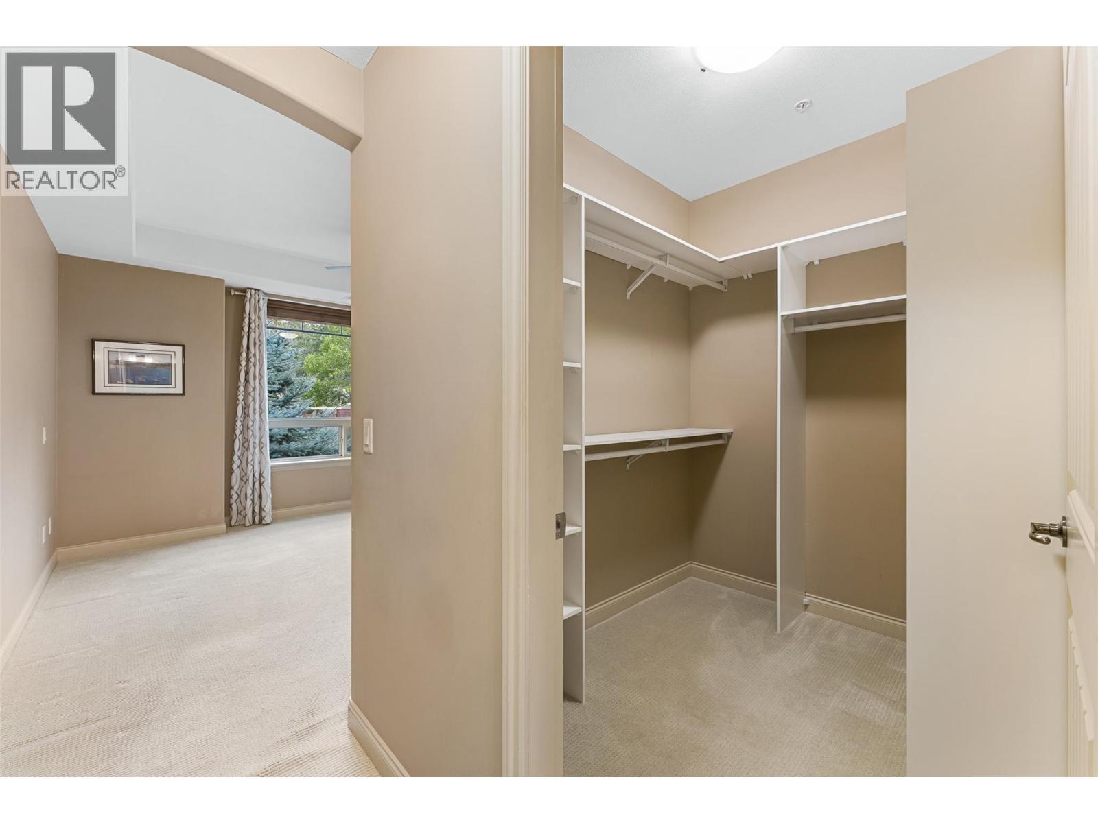 Huge custom walk-in closet. - 2780 Auburn Road Unit# 203, West Kelowna, BC