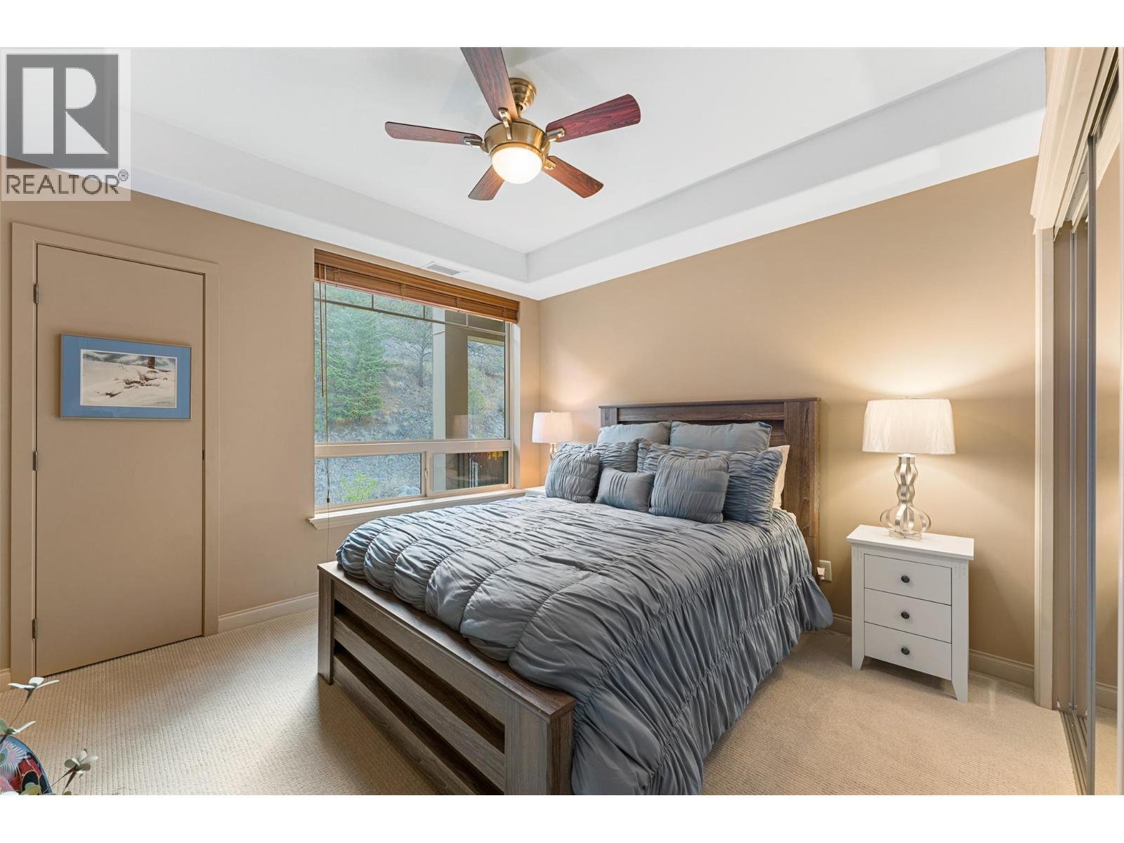 Second bedroom, thoughtfully located at the opposite end of the condo. - 2780 Auburn Road Unit# 203, West Kelowna, BC