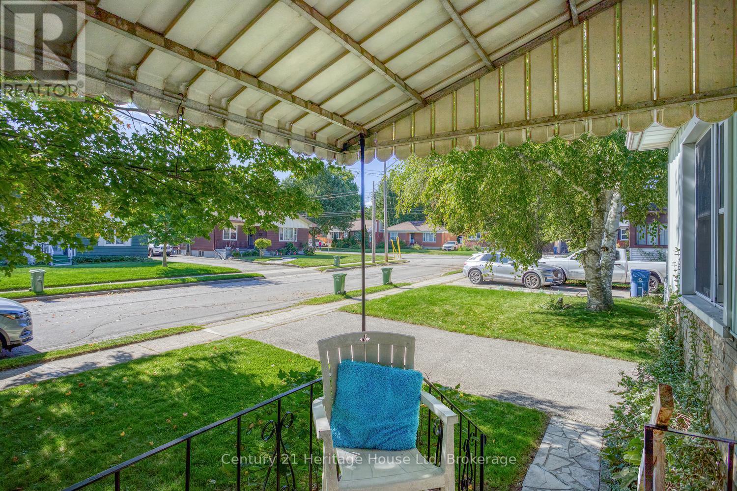 Road view from the covered front porch - 91 Merion Street, Guelph (Junction/Onward Willow), ON