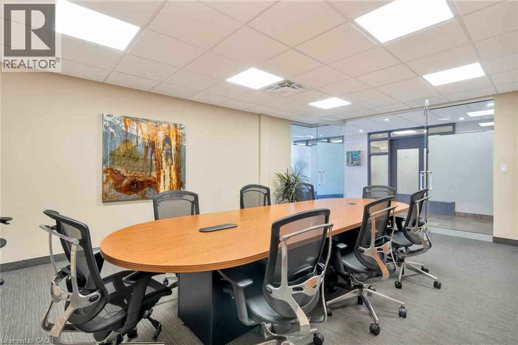 Recessed lighting, wood-finish conference table, glass partitions, carpeted flooring, acoustic ceiling tiles - 23 Market Street W, Port Dover, ON