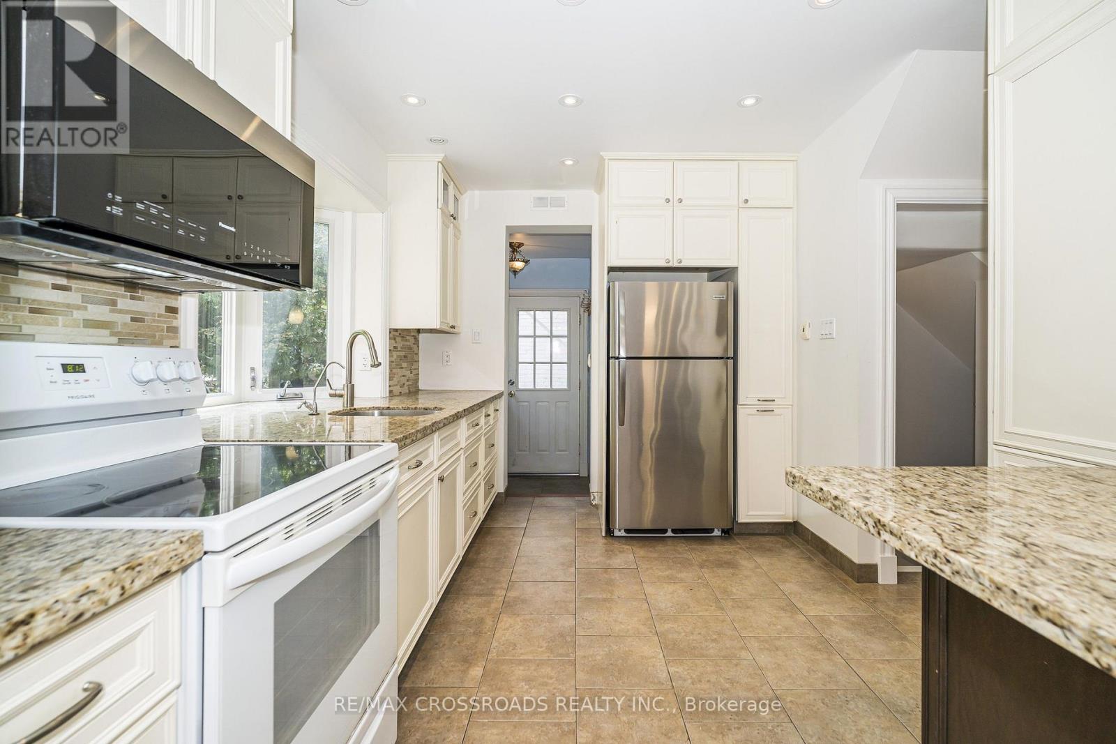 Loads of Cabinetry - 19 Strathgowan Crescent, Toronto, ON
