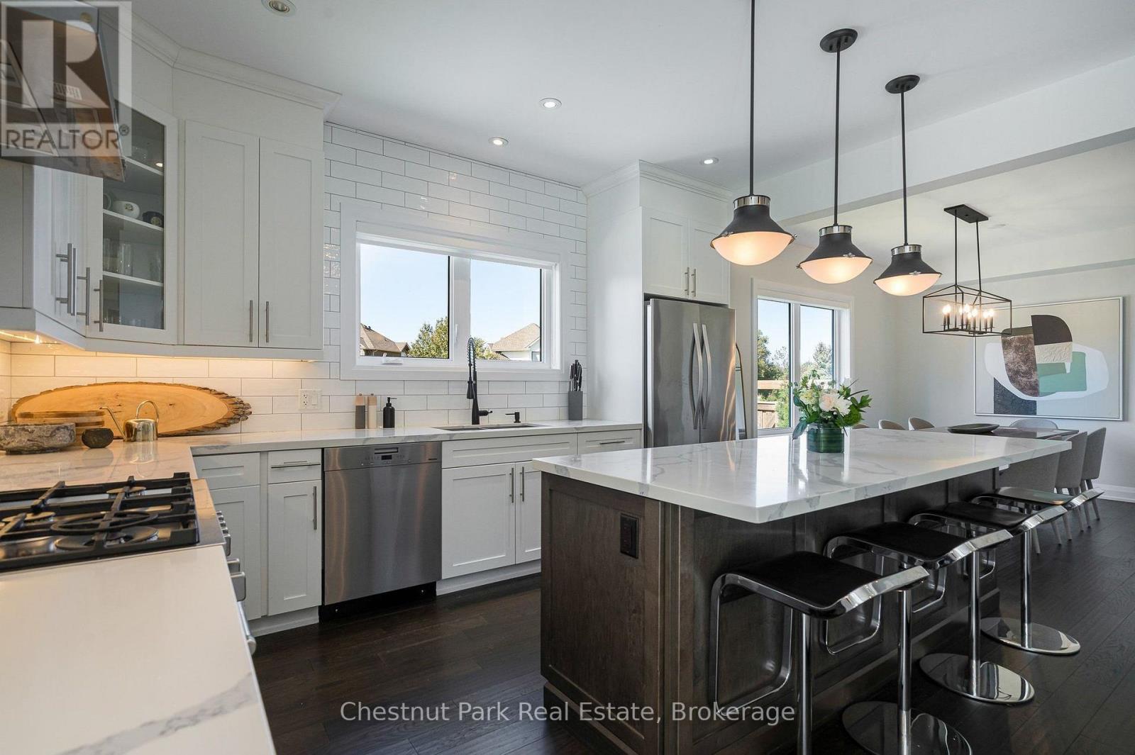 Gourmet chef's kitchen - oversized centre island - 154 Brooker Boulevard, Blue Mountains, ON