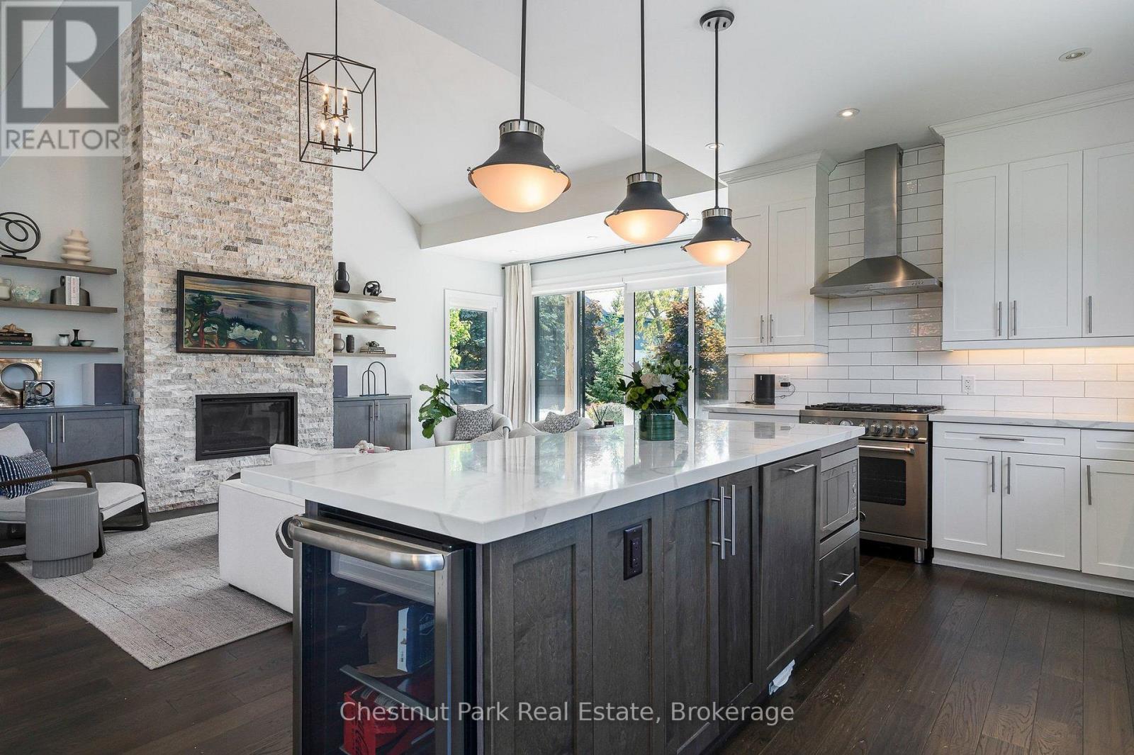 Oversized centre island with bar fridge - 154 Brooker Boulevard, Blue Mountains, ON