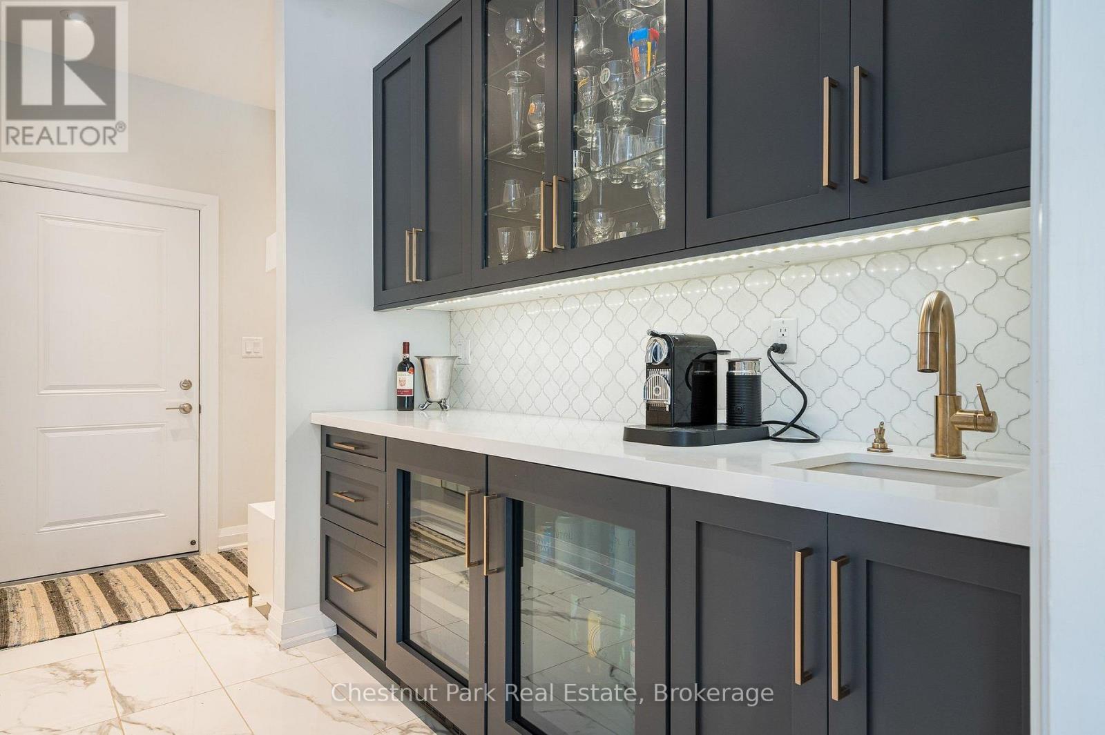 Pantry with inside access to the 2 car garage - 154 Brooker Boulevard, Blue Mountains, ON
