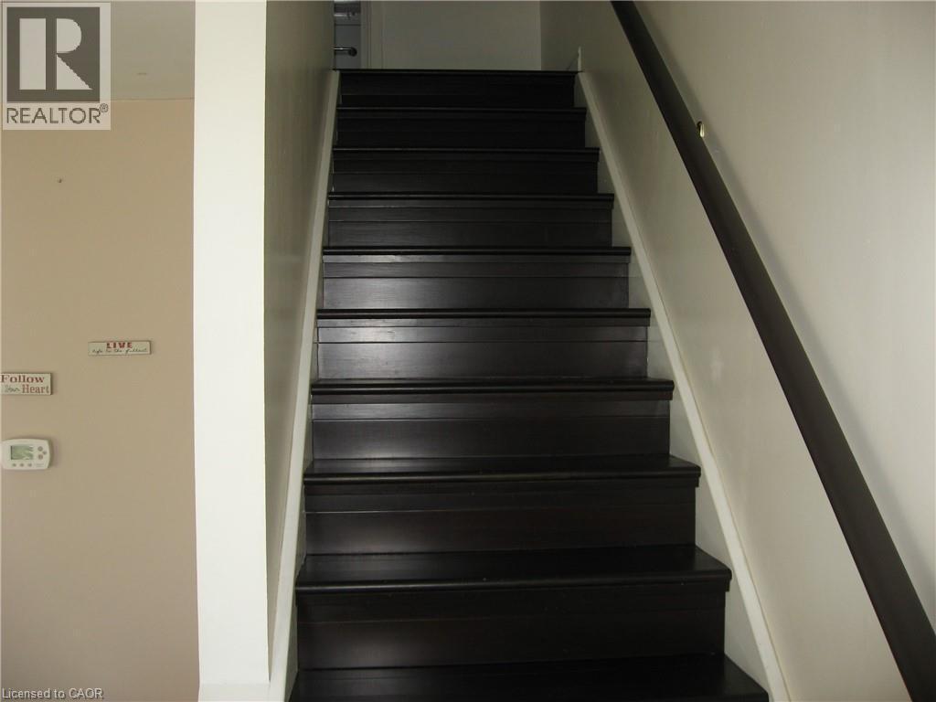 Staircase to upper level - 124 Avalon Place, Kitchener, ON