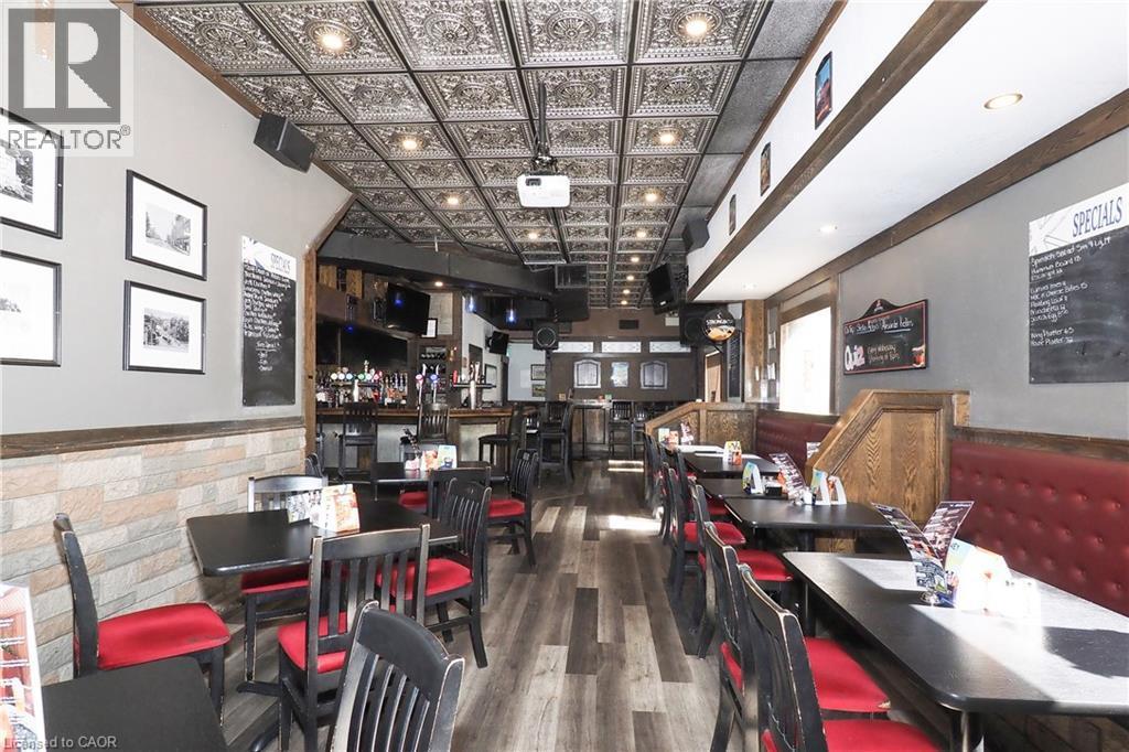 Recessed lighting illuminates a patterned ceiling - 707 E King Street E, Cambridge, ON