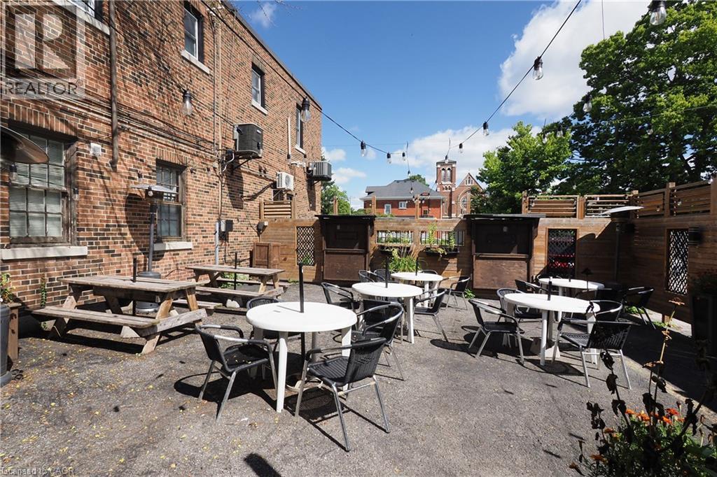 Brick exterior building with multiple windows - 707 E King Street E, Cambridge, ON