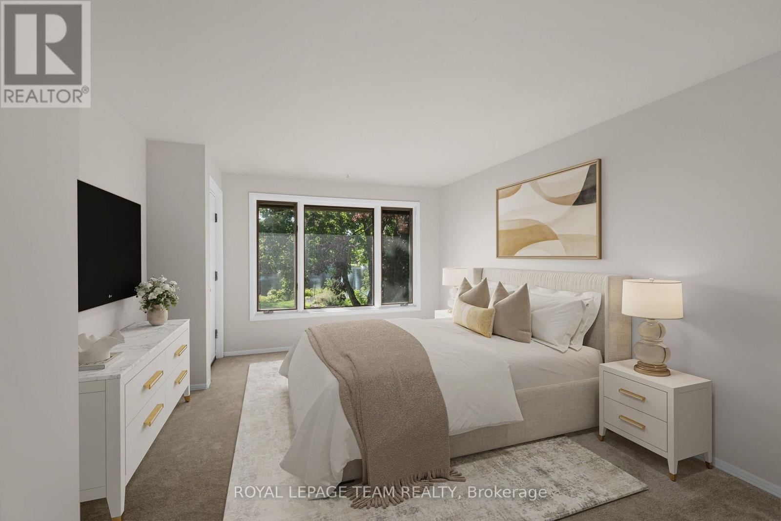 This photograph has been virtually staged. - 6591 Marina Drive, Ottawa, ON