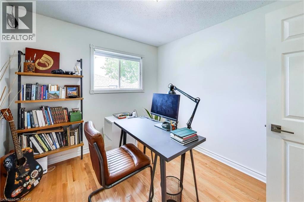 Hardwood flooring, painted walls, white trim, and a window with natural light - 35 Shirlea Boulevard, Keswick, ON