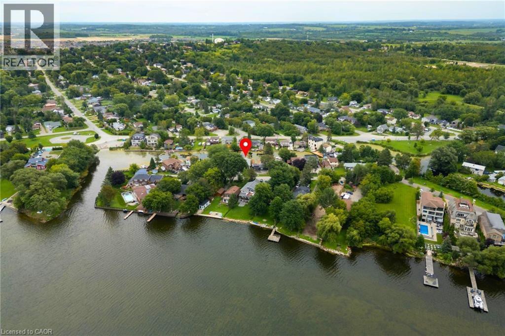 Waterfront property with private dock access and surrounding mature trees - 35 Shirlea Boulevard, Keswick, ON