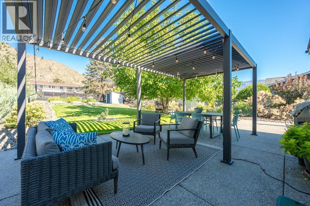 Large patio with gazebo - 886 Fairview Road, Oliver, BC