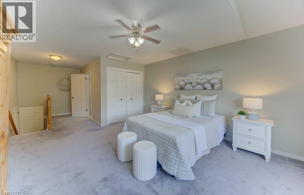 Primary bedroom - up ½ flight of stairs from main level. Vaulted ceiling - 26 Stanmore Avenue, Kitchener, ON
