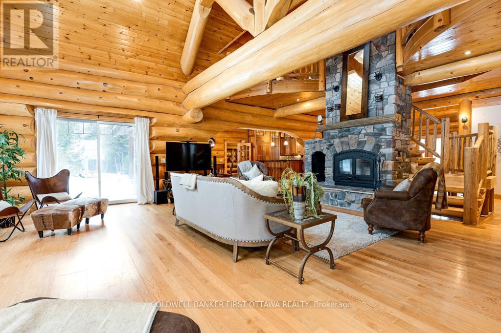 Impressive two-storey stone fireplace - 2467 Darling Road, Lanark Highlands, ON