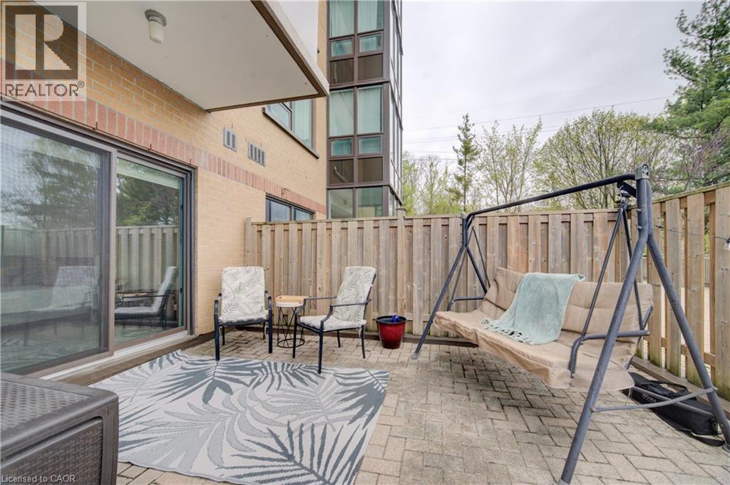 Photo taken prior to vacancy. - 237 King Street W Unit# 102, Cambridge, ON