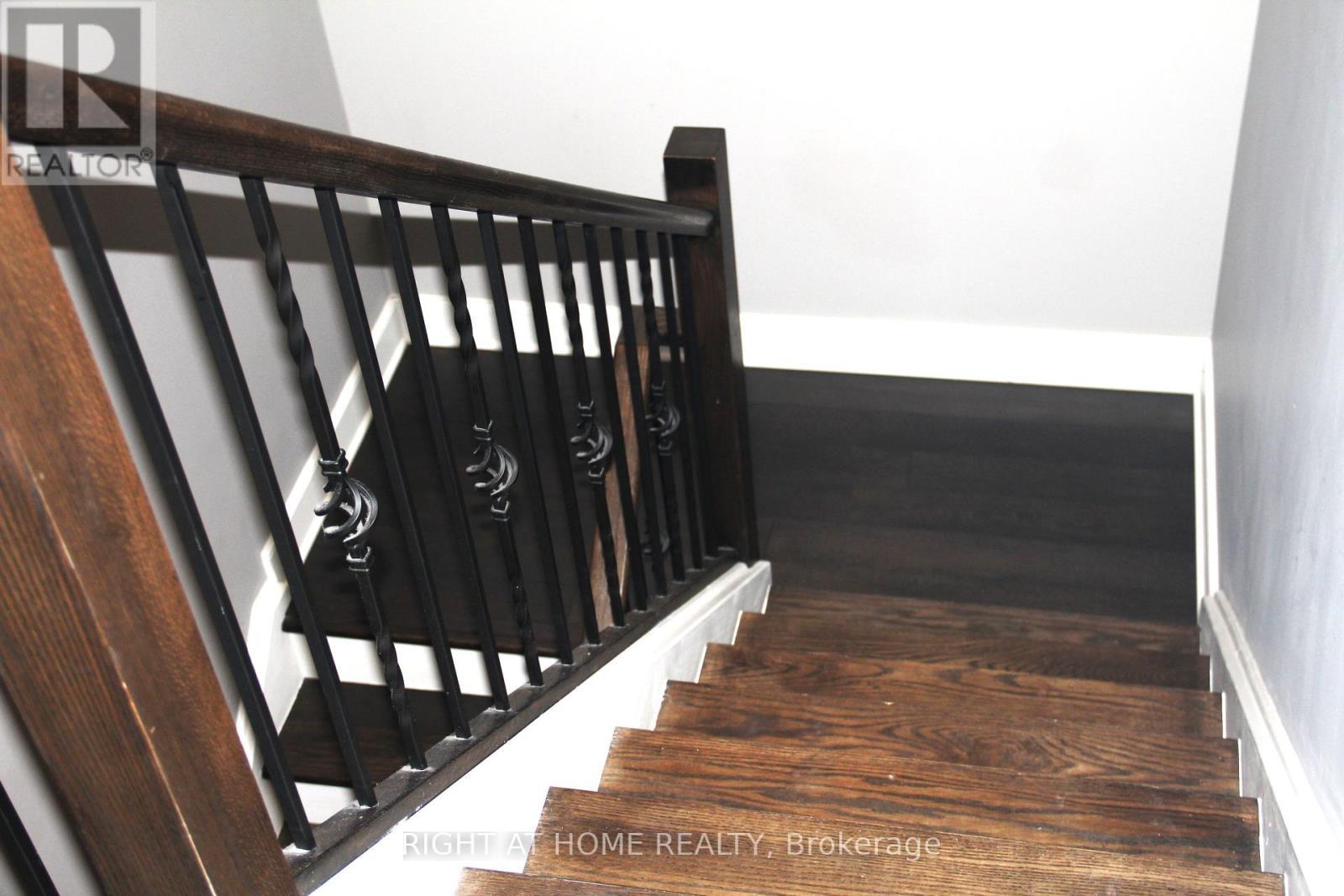 Stairs to upper floor - 202 - 340 Sugarcreek Trail, London North, ON