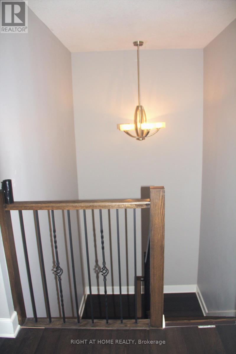 Stair to upper floor - 202 - 340 Sugarcreek Trail, London North, ON