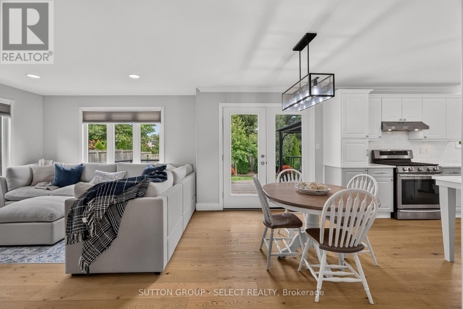 Open concept living/kitchen/dining with patio door - 121 Tanoak Drive, London North (North E), ON