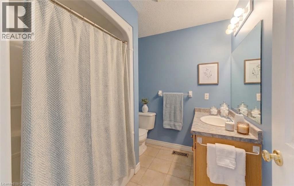 Family Bathroom Digitally Staged - 25 Bankside Drive Unit# 2, Kitchener, ON