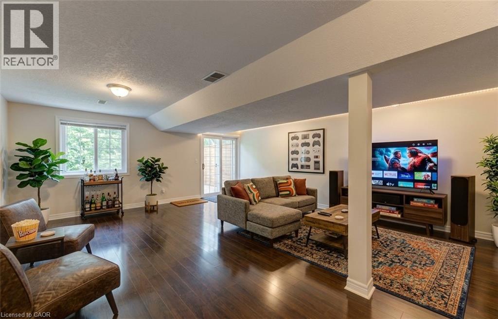 Rec Room Digitally Staged - 25 Bankside Drive Unit# 2, Kitchener, ON