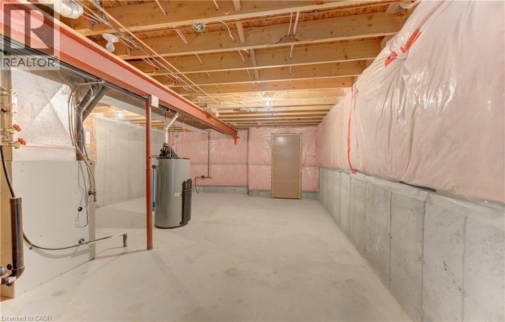 Unfinished storage space in basement - 25 Bankside Drive Unit# 2, Kitchener, ON
