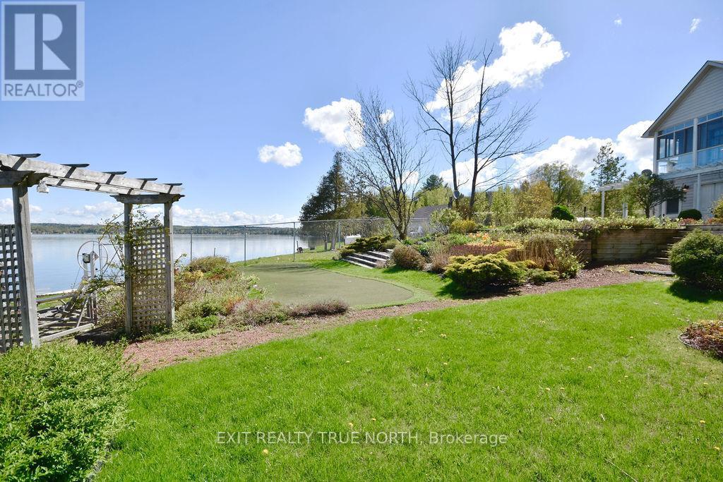 Enjoy a professionally landscaped yard - 3021 Sandy Bend, Springwater, ON