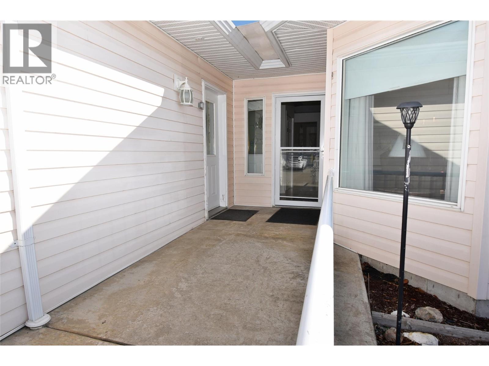 Front door and side door to garage - 5309 21 Street, Vernon, BC