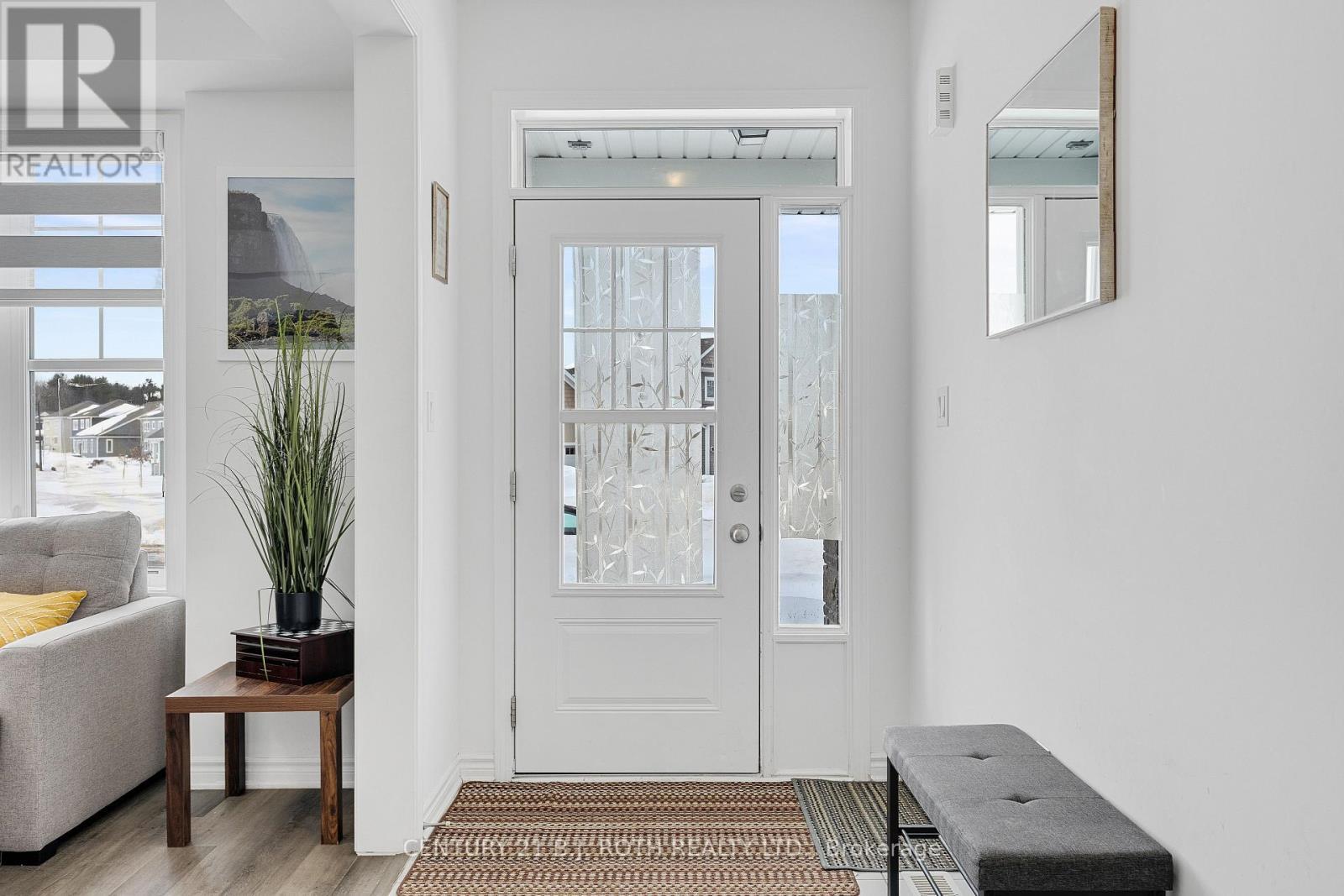 Front Entry with Natural Light Pouring Through - 22 Dyer Crescent, Bracebridge, ON