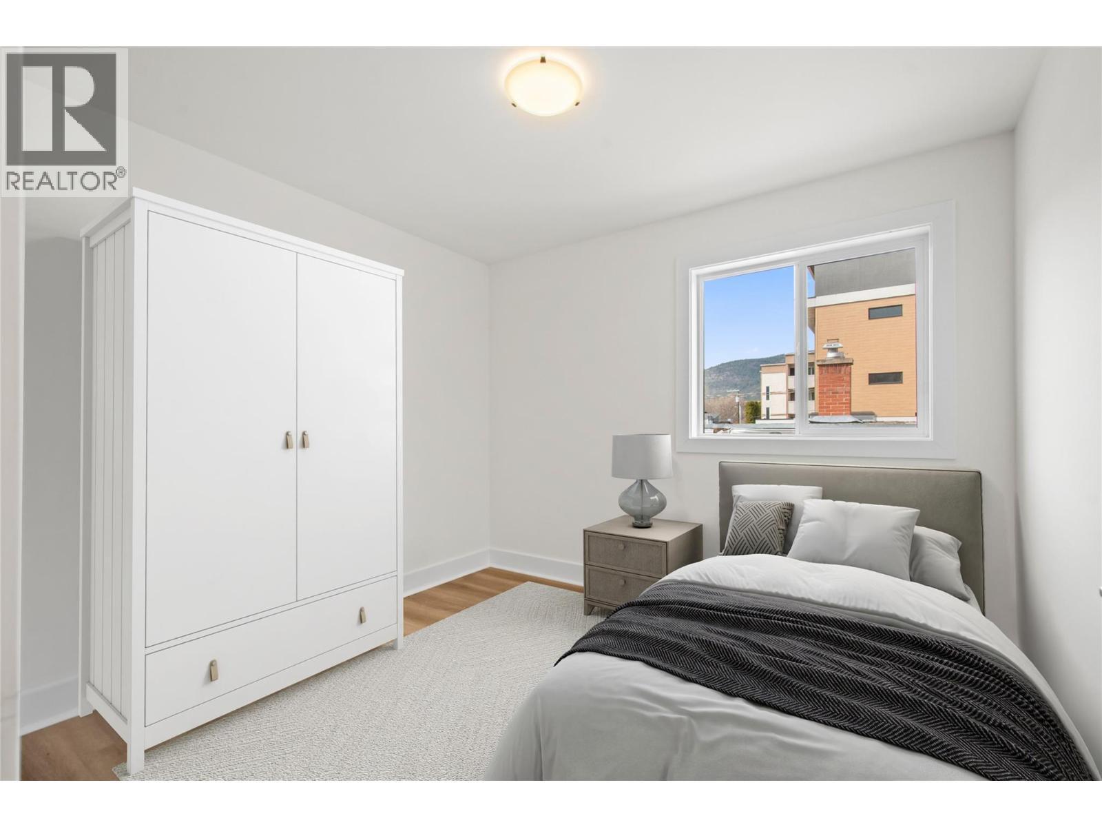Virtually staged bedroom - 578 Lakeshore Drive Unit# 203, Penticton, BC
