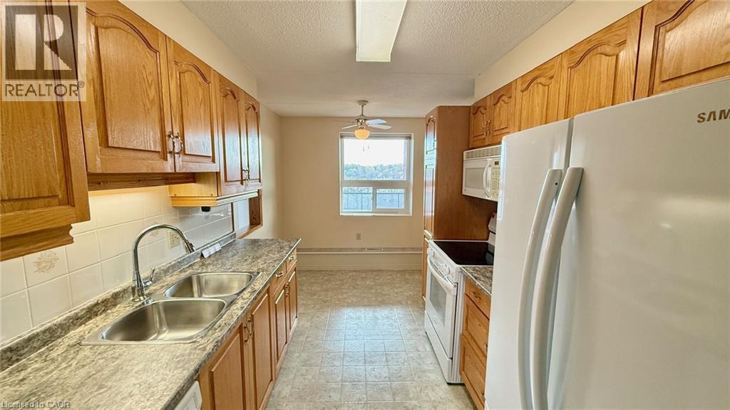 KITCHEN - UPDATED COUNTERTOPS - 2025-11-06 - 5 Mill Pond Court Unit# 604, Simcoe, ON