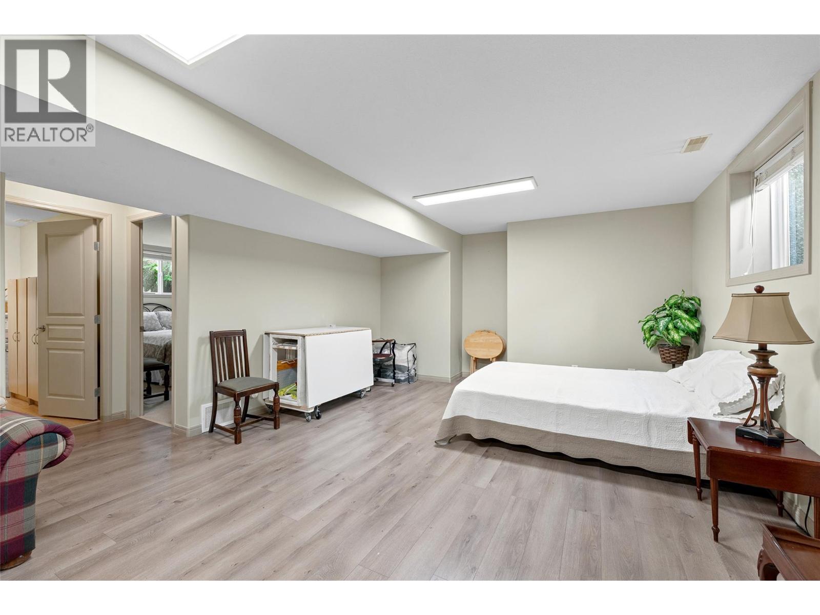 Expansive lower-level family room offering flexible living space. - 1188 Houghton Road Unit# 122, Kelowna, BC