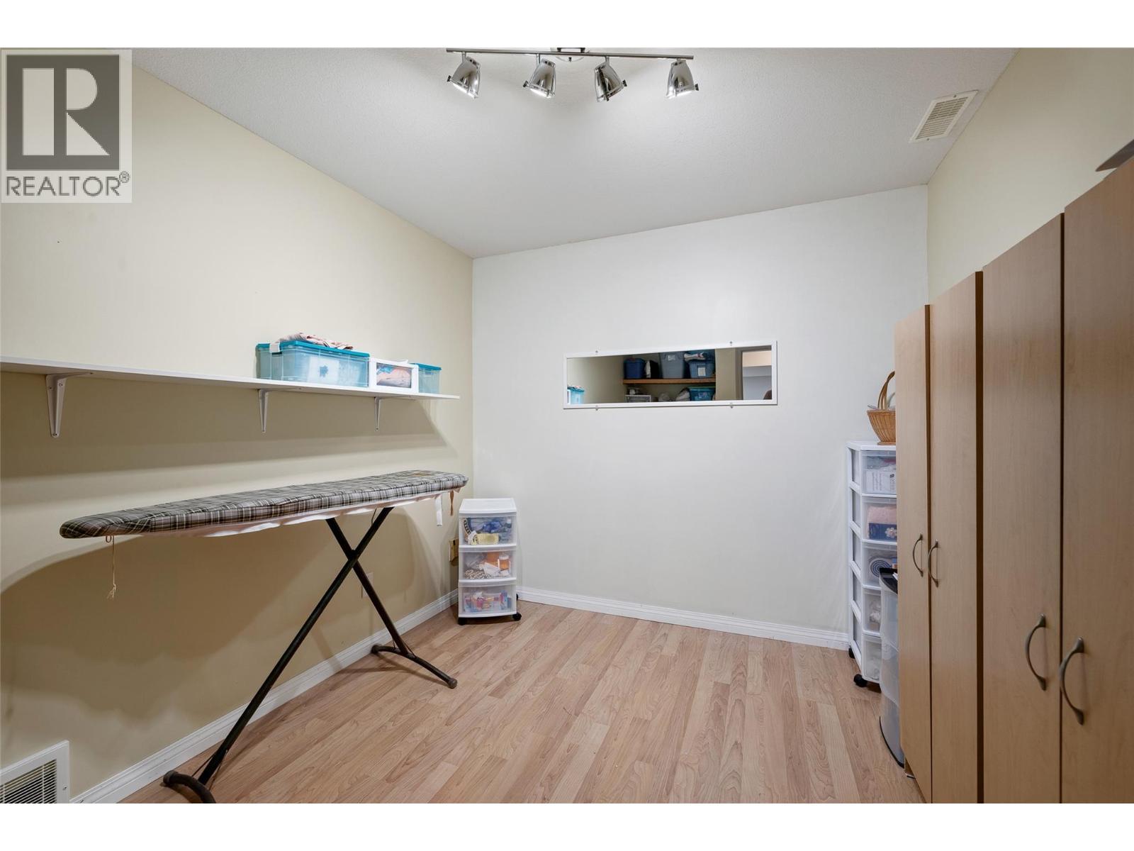 Versatile den—perfect for a home office, hobby room, or quiet retreat. - 1188 Houghton Road Unit# 122, Kelowna, BC