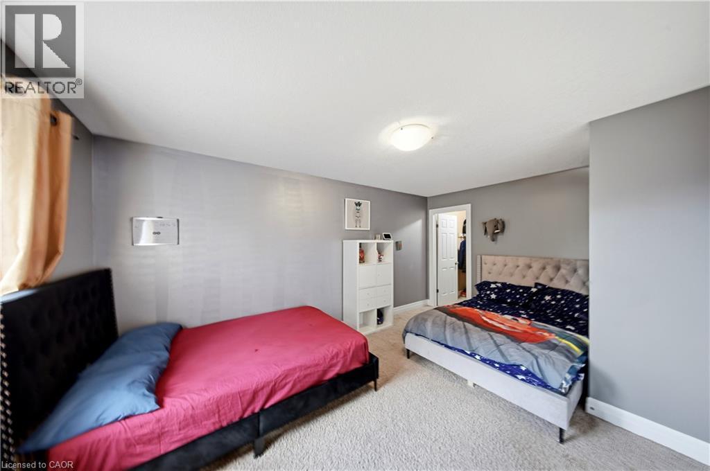 Wall-to-wall carpeting and neutral wall tones - 167 Broadoaks Drive, Cambridge, ON