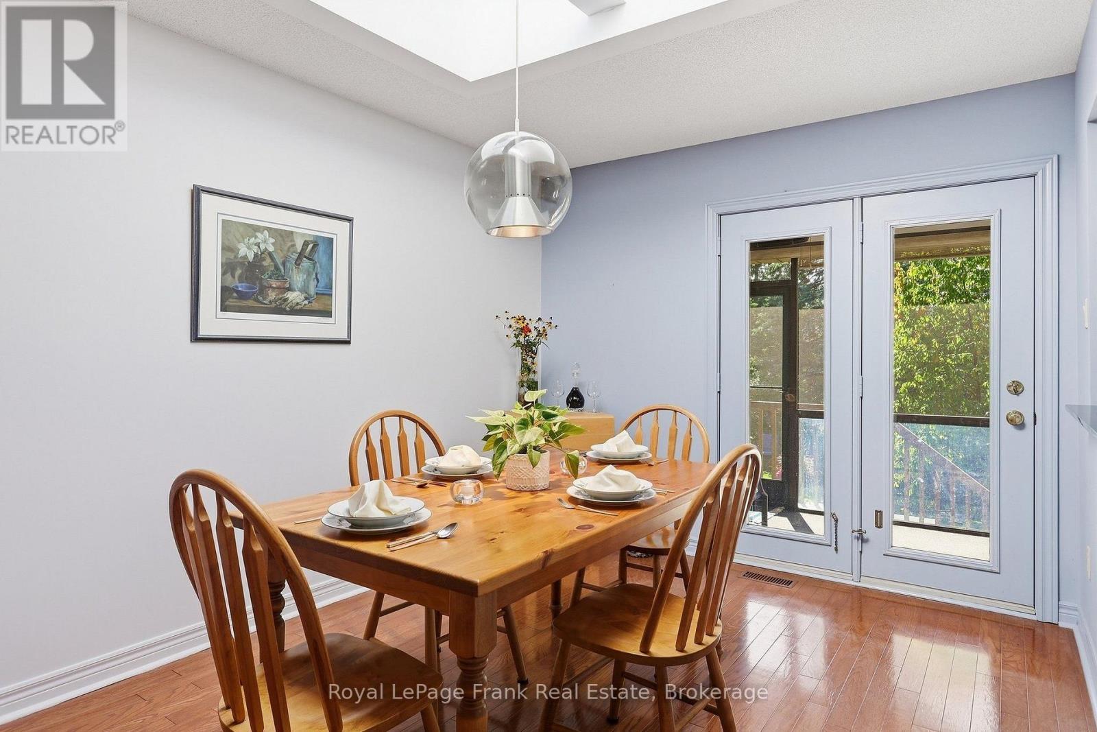 DINING ROOM TO SCREENED IN PORCH AREA - 3 Ports Drive, Kawartha Lakes (Bobcaygeon), ON