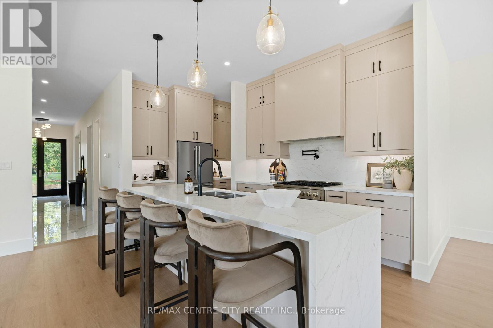 A kitchen that never ends, winding around corner - 53900 Heritage Line, Bayham (Richmond), ON